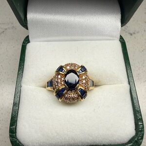 Elegant blue sapphire and diamond ring set in 18k gold size 7
